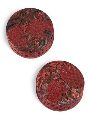 Pair of red lacquer circular boxes with fruits