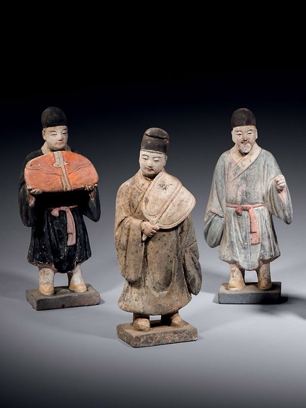 Pottery group of male figures