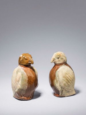 Pair of owl-shaped pottery jars