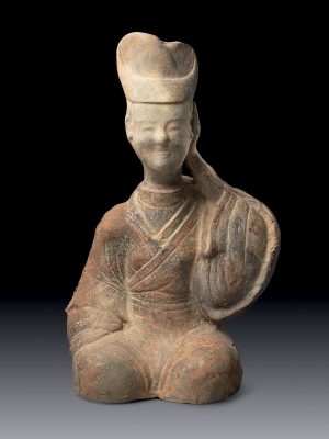 Pottery figure with hand on ear