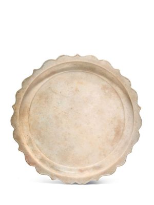 White marble dish with scalloped rim