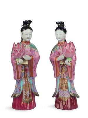 Pair of famille rose porcelain candleholders shaped as female immortals