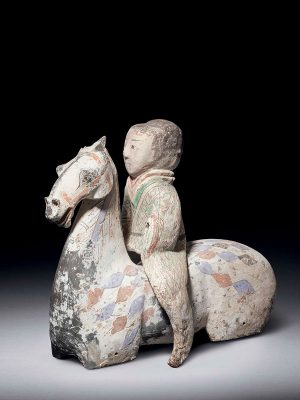 Two pottery horse torsos with riders