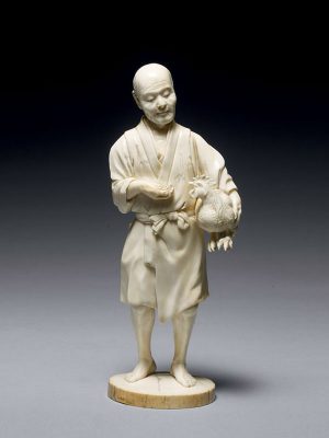 Ivory okimono of a man holding a cockerel