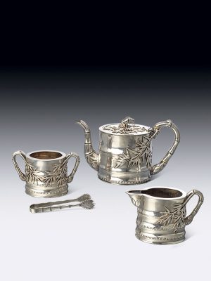 Three-piece silver tea set by Cumshing