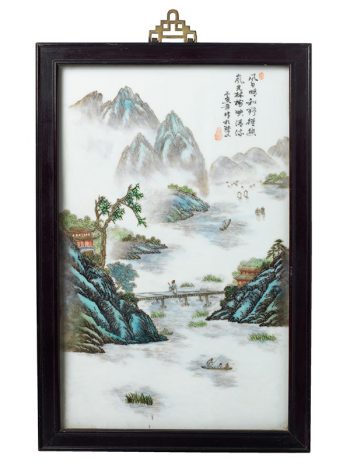 Porcelain plaque with a figure crossing a bridge in a river landscape