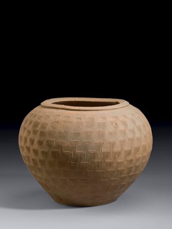 Pottery jar with impressed combed pattern