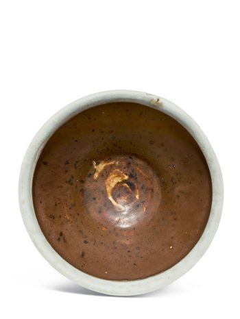Stoneware bowl with brown glaze and white rim