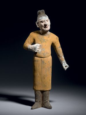 Pottery figure of a foreign groom