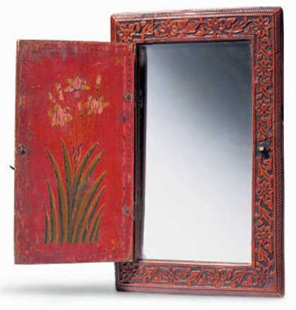 Carved wood mirror case