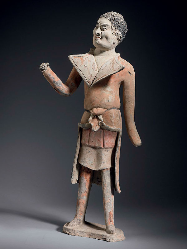 Pottery figure of a foreign groom