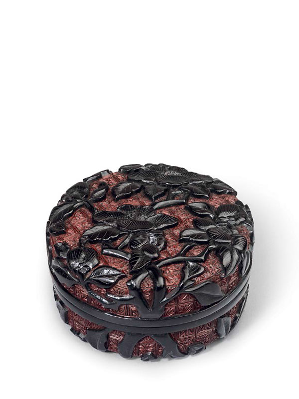 Black and red lacquer circular box with camellia flowers