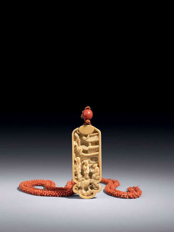 Ivory pendant with coral-bead necklace 