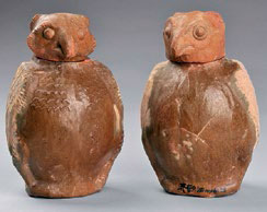 Fig. 1 Pair of owl-shaped pottery jars, Henan Museum