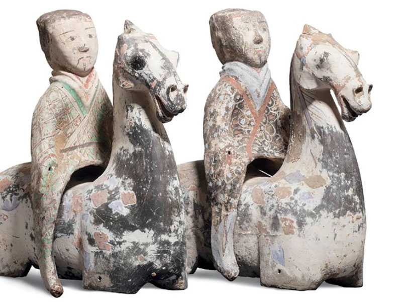 Two pottery horse torsos with riders 