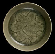 Fig. 1 Yaozhou stoneware saucer with wave pattern, Victoria and Albert Museum