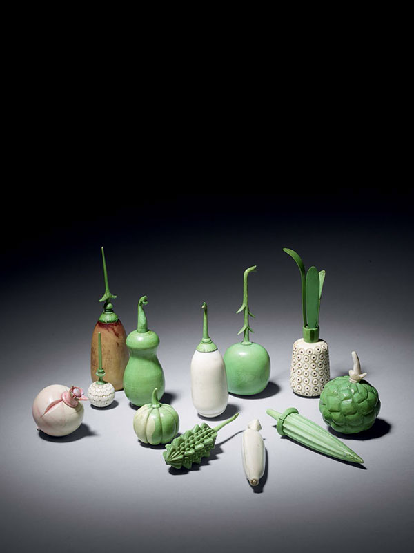 Group of ivory scent bottles in the shape of vegetables and fruits