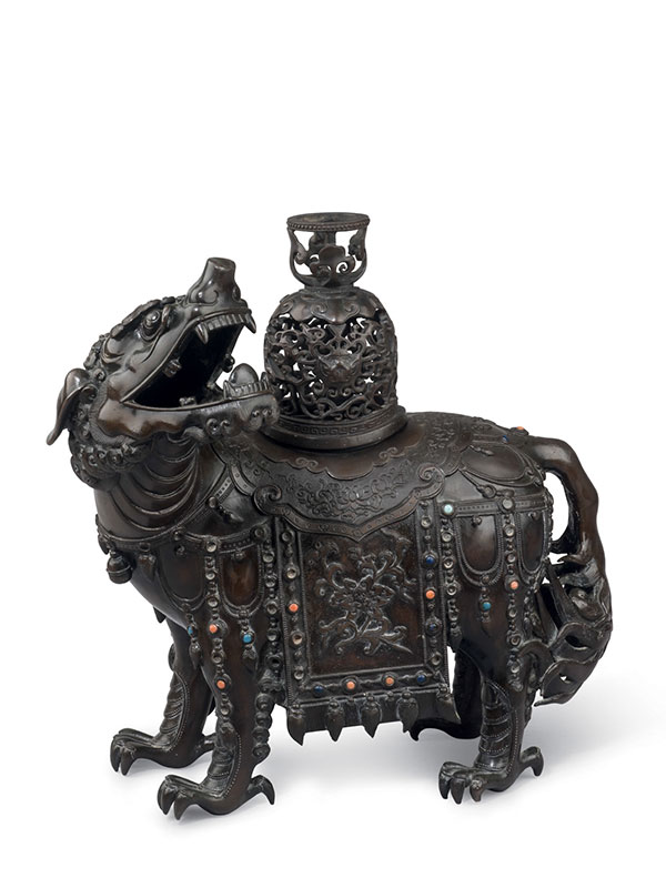 Bronze incense burner in the form of a lion-like mythical animal