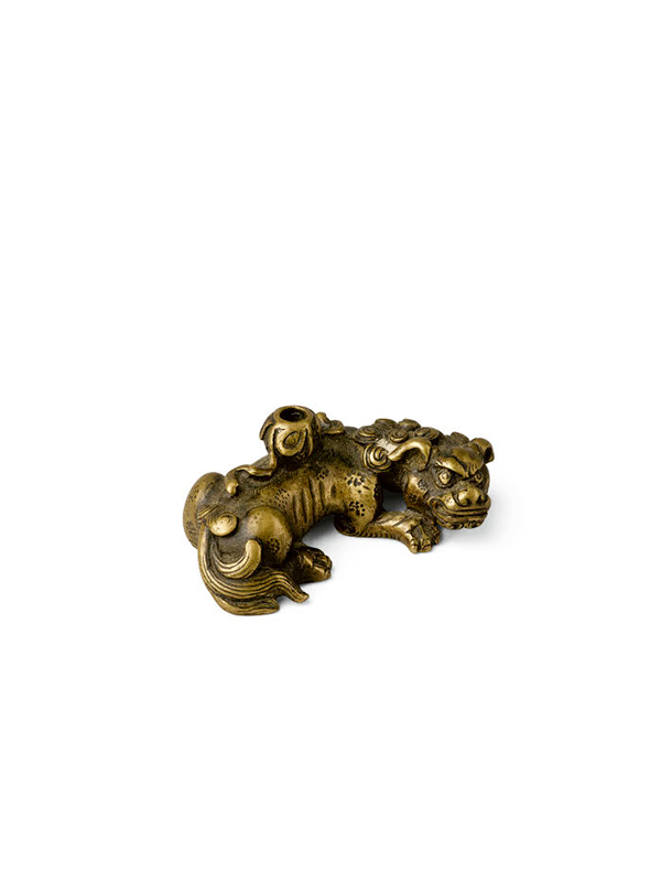 Gilt bronze paperweight in the form of a recumbent lion
