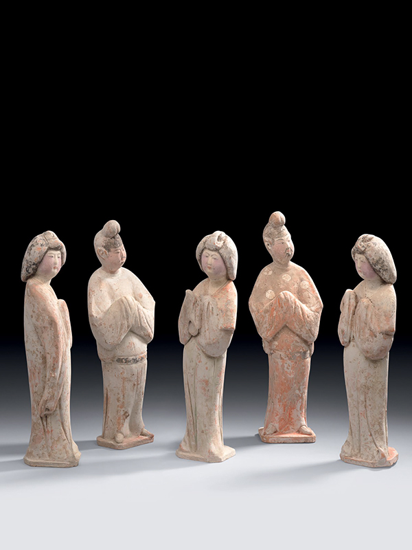 Group of five pottery figures