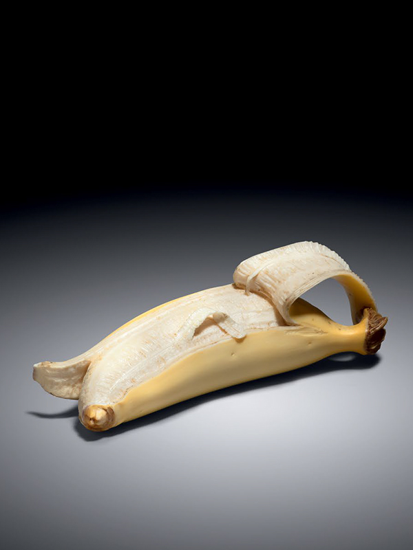 Ivory okimono of a half-peeled banana