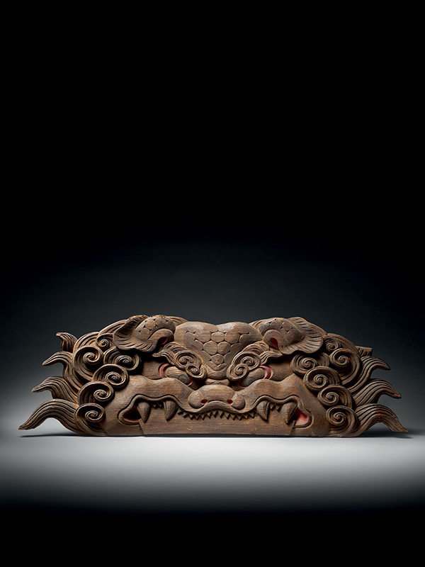 Architectural carving of a monster’s mask