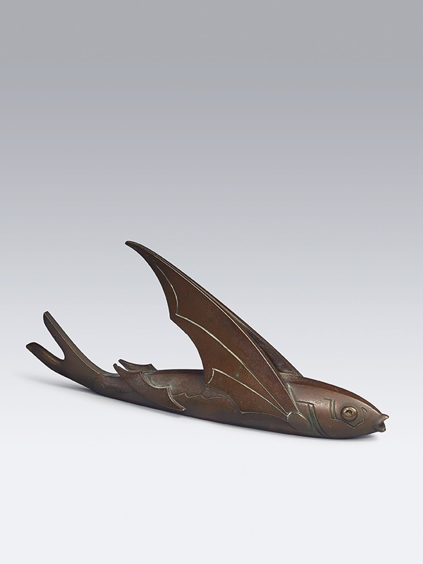 Bronze paperweight of flying fish